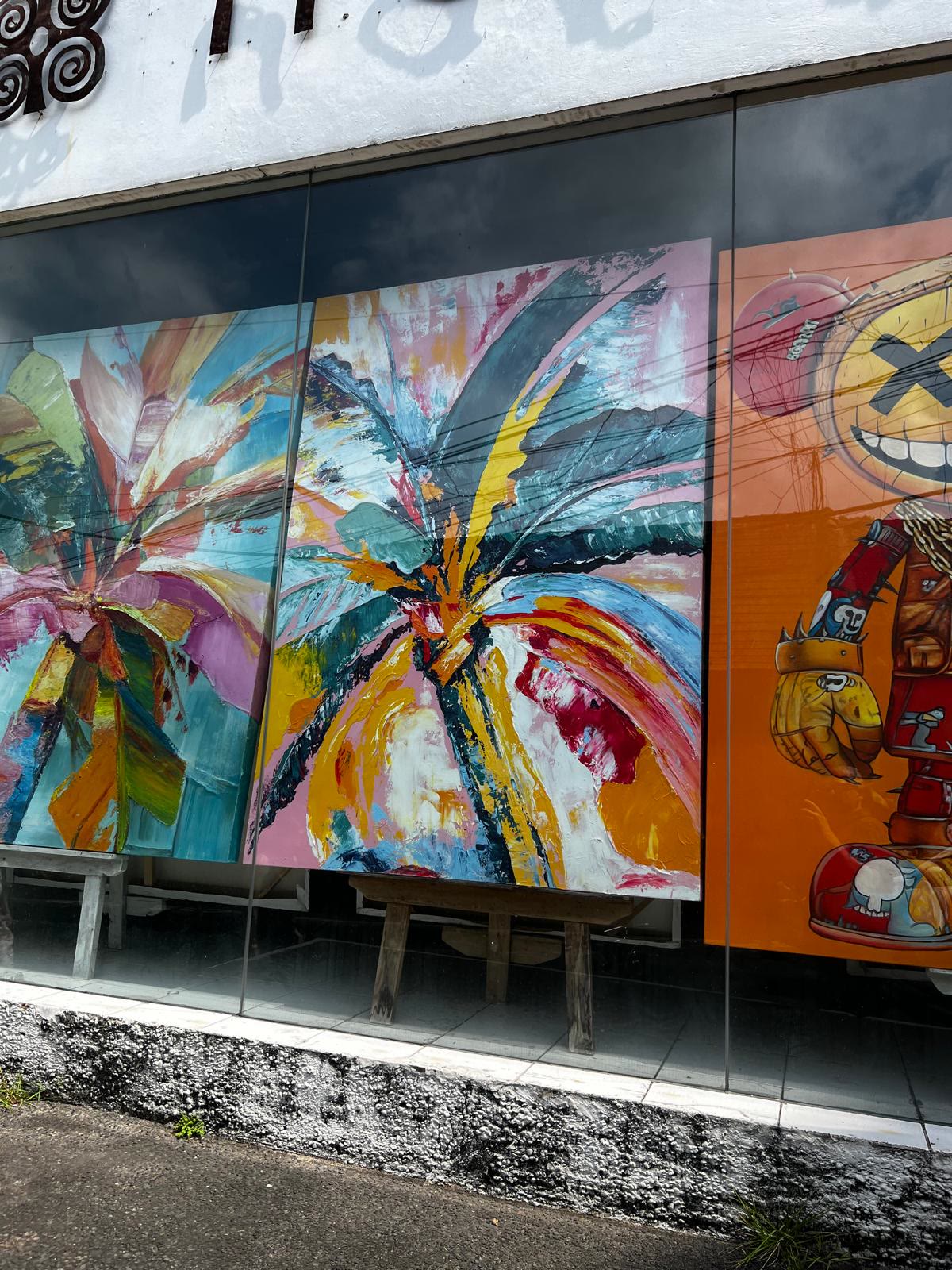 Tropical paintings in a Bali gallery window